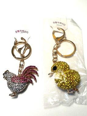 Set of two rhinestone studded keychains. Rooster and baby chick.
